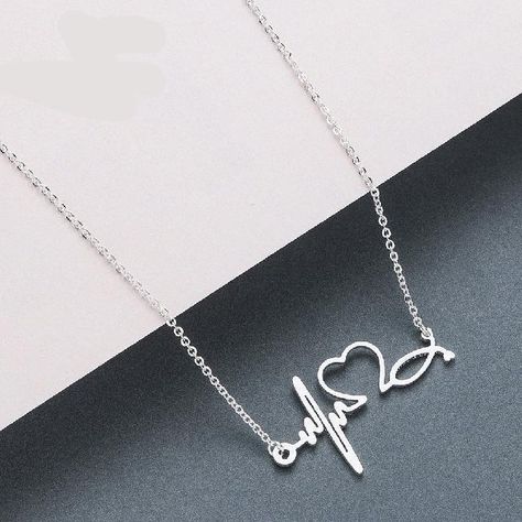 #Doctornecklace #NurseNecklace #women'snecklace #Jewelryaddict #jewels #Fashionable #Boho #Style #Hot Doctor Jewelry, Nurse Jewelry, Heartbeat Necklace, Medical Jewelry, Dainty Diamond Necklace, Nurse Doctor, New Heart, Solitaire Necklaces, Yellow Gold Pendants