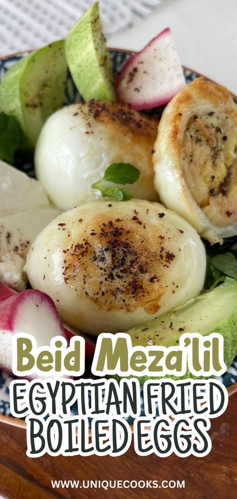 Try this Egyptian fried boiled eggs recipe for a unique and crunchy snack. Known as Beid Mezalil, these eggs are fried to perfection and seasoned with spices. This dish is a delightful combination of crispy texture and rich flavor. Perfect for breakfast or as an appetizer. Fried Boiled Eggs Recipe, Fried Boiled Eggs, Cucumber Beet Salad, Pomegranate Molasses Dressing, Boiled Eggs Recipe, Turkish Cheese, Egyptian Food, Crunchy Snack, Eggs Recipe