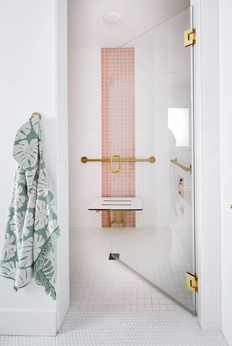 Using colored grout is a unique way to add color to a kids bathroom without committing to a bold tile or paint color. The pale pink grout here matches the soft blush tile in the walk-in shower and adds subtle color to the otherwise all-white room. #pinktilebathroom #bathroomideas #bhg Colorful Shower Tile, Bathrooms With Bath, Fun Kids Bathroom Ideas, Kids Bathroom Storage, Fun Kids Bathroom, Secondary Bathroom, Bedroom Design Master, 2024 Bathroom, Bathroom Interior Design Modern