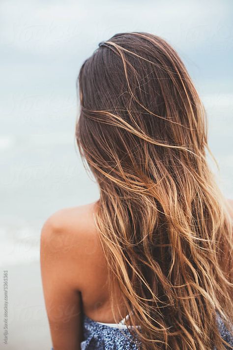 Stock photo of Woman on the Beach by marija Surf Highlights Beach Hair, Surfer Hair Highlights, Surfer Hair Brunette, Beachy Hair Brunette, Beach Highlights Brunette Sun Kissed, Surfer Brown Hair, Surfer Highlights Brunette, Beach Hair Color Brunette, Beachy Highlights Brown Hair Summer