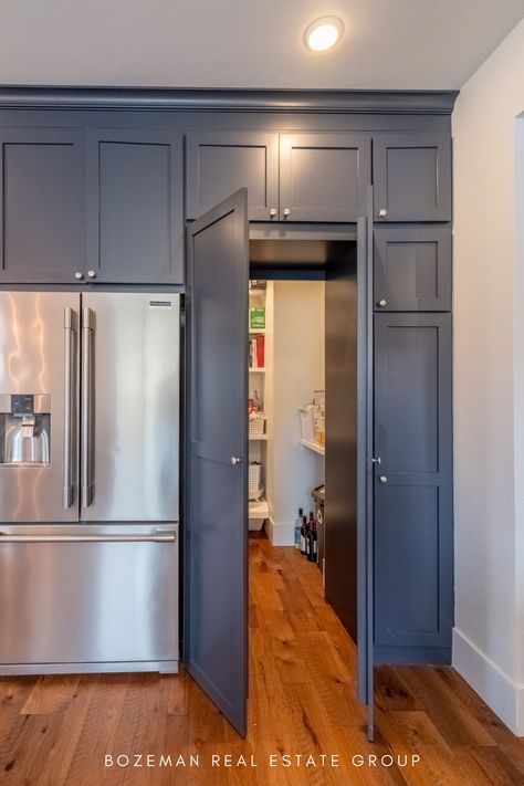 Kitchen goals! We love this hidden walk-in pantry and the blue cabinetry! Double Wide Interior, Pantry Door Design, Hidden Pantry Walk In, Arizona Cottage, Entryway Pantry, Laundry Butlers Pantry, Kitchen Pantry Door, Blue Cabinetry, Kitchen Pantry Doors