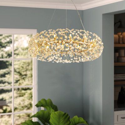 Inspired by nature, this Dandelion Ring Crystal Chandelier is more of a work of art than a chandelier. The chandelier's new design gives it a textured look. When lit, the golden crystal chandelier is gorgeous and blooms like a dandelion, making your home more beautiful and unique. House of Hampton | House of Hampton Dandelion 2 - Light Dimmable Round Crystal Chandelier gray/Yellow 12.0 x 23.62 x 23.62 in, Metal;Crystal | C010145105 | Wayfair Canada Dandelion Ring, Celing Light, Round Crystal Chandelier, Sphere Chandelier, Bedroom Chandelier, Chandelier Gold, Refraction Of Light, Golden Crystal, Hampton House