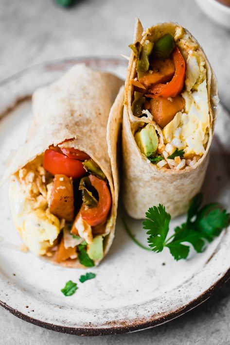 Freezer breakfast burritos that are packed with sweet potatoes, veggies and protein for the ultimate on the go breakfast. Make them ahead and reheat later! #freezerfriendly #burritos #healthybreakfast #eggrecipe #vegetarianrecipe #highprotein #mealprepping Bean Breakfast, Easy Breakfast Burritos, Freezer Breakfast Burritos, Healthy Breakfast Bowl, Healthy Breakfast Meal Prep, Low Carb Wraps, Ambitious Kitchen, Overnight Oat, Chips Ahoy