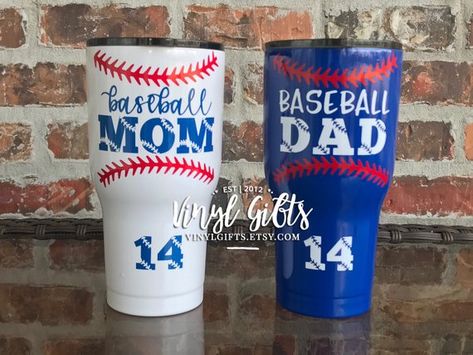 Baseball Mom and Baseball Dad RTIC 30 ounce Tumblers are a great way to stay hydrated during the game! Our RTIC Tumblers are stainless steel and double wall vacuum insulated. Keeps your drinks ice cold longer - works great for hot beverages. The included all-new shaded Splash Proof lid lets you Gifts For Mom And Dad, Baseball Cup, Baseball Tumbler, Cups Ideas, Baseball Crafts, Glitter Tumbler Cups, Glitter Tumblers, Tumbler Cups Diy, Glitter Cups