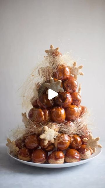 Zoë François on Instagram: "Croquembouche! A tower of cream puffs held together with caramel is a sensational centerpiece for a holiday table. Everything about this dessert brings me joy! ♥️🎄Happy Holidays!  #holiday #baking #zoebakes #croquembouche" Cream Puff Tower, Cream Puffs, Holiday Table, Holiday Tables, Holiday Baking, A Holiday, Happy Holidays, Caramel, Tower