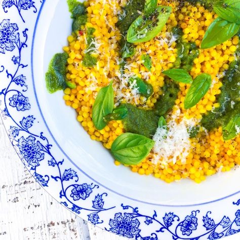 Saffron Couscous with Almond Pesto Saffron Couscous, Vegetarian Couscous, Pesto Basil, Microplane Zester, Megan Mitchell, Almond Pesto, Sauce Pot, Delish Recipes, Grain Foods