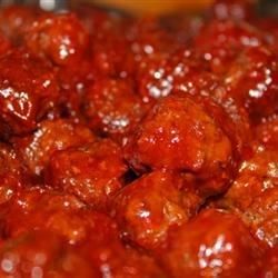 Sweet and tangy cocktail meatballs are baked in a fruity and colorful cranberry sauce glaze in this recipe that originated on Cape Cod.