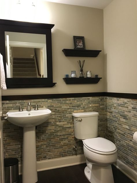 Half bathroom with stone, chair rail and floating shelves. Black Chair Rail Bathroom, Bathroom With Chair Rail, Bathroom With Stone, Stone Chair, Lake Bathroom, Bathroom Chair, Bathroom Upgrade, Dado Rail, Home Remodeling Diy