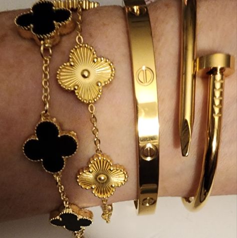 One Gold Clover,One Black Clover, One Nail Bangle. Extra Large 8.5 Size. One Love 8.5 Size. Please Advise If You Would Like Regular Size. Clovers Extend To 9 Inches. All Bracelets Are Stainless Steel. Gold Is 18kt Gold Plating Overlay. Jewellery Essentials, Clover Bracelets, Nail Bangle, Ceramic Beads Bracelet, Nail Bracelet, Dream Bags, Brighton Bracelets, Metal Cuff Bracelet, Wide Cuff Bracelets