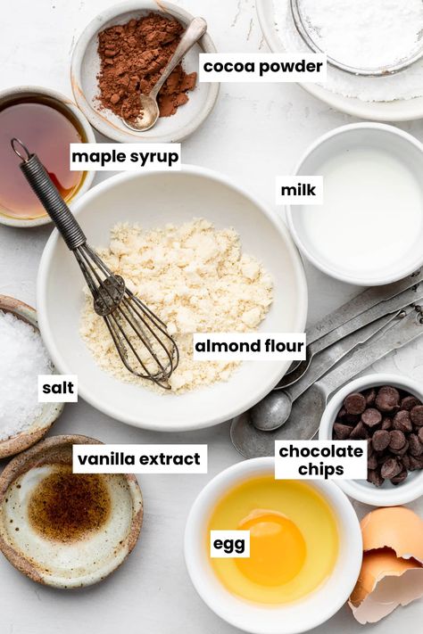 Ingredients in the recipe, including egg, cocoa powder, maple syrup, milk, almond flour, chocolate chips, vanilla extra, and salt. Mug Cake Healthy, Gluten Free Flour Blend, Salted Chocolate, Dairy Free Milk, Cake Tasting, Baking Flour, Mug Cake, Unsweetened Cocoa, Dark Chocolate Chips