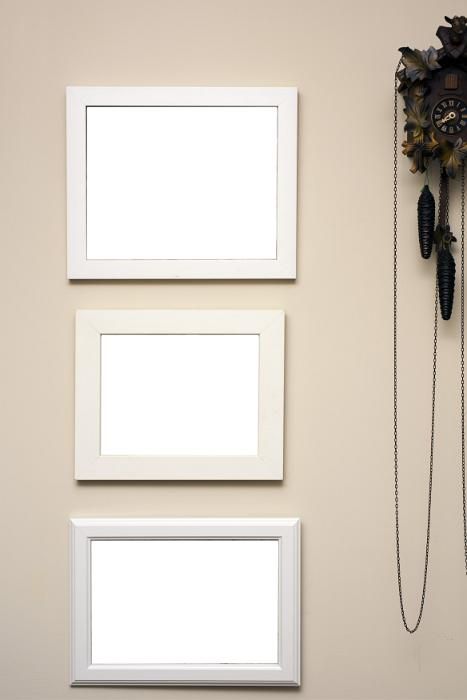 Three empty frames hanging on a beige colored wall alongside a wooden carved cuckoo clock with pendulums - free stock photo from www.freeimages.co.uk Silk Rose Petals, Blank Photo, Empty Frames, Silk Rose, Frame Wall, Cuckoo Clock, Rose Petals, Wall Colors, Free Image