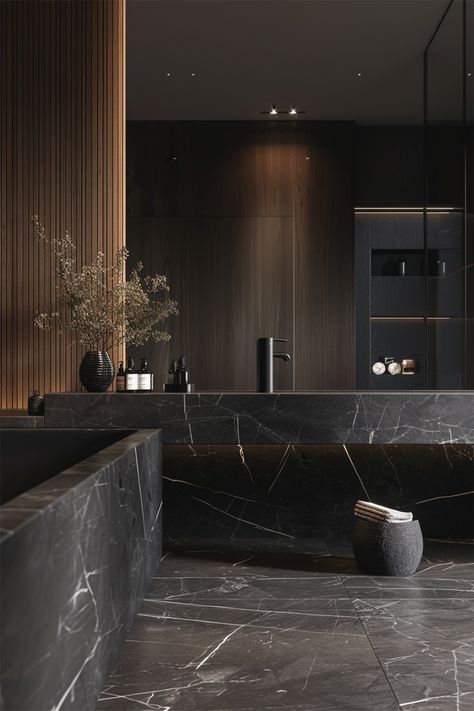 Textured Harmony • A bathroom that pairs sleek dark marble with warm wood accents • Built-in bathtub seamlessly blends with the marble surround • Vertical wood slats create a striking contrast against the smooth stone • Black vessel sink sits atop the marble countertop, mirroring the dark elegance • Delicate dried botanicals in a textured vase add an organic touch • Recessed shelving with soft backlighting for a subtle, inviting glow Bathroom With Black Marble Countertop, Nero Marquina Bathroom, Brown Marble Bathroom, Calacatta Bathroom, Black Vessel Sink, Recessed Shelving, Dark Brown Bathroom, Black Marble Bathroom, Built In Bathtub