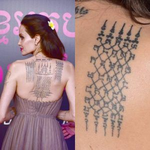 The meanings behind Angelina Jolie's tattoos - All Day Tattoo Thai Tattoo Ideas, Angelina Jolie Back Tattoo, Thai Tattoo Designs, Thai Tattoo Meaning, Tattoo Thai, Armour Tattoo, Angelina Jolie Tattoo, Traditional Thai Tattoo, Borneo Tattoos