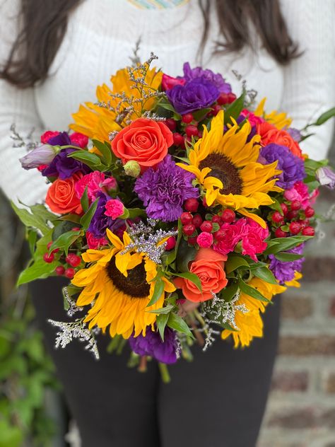 Purple Orange Yellow Wedding Flowers, Red Purple Yellow Bouquet, Purple Yellow Red Wedding, Red Yellow Purple Flower Arrangements, Sunflower Pink Bouquet, Purple Arrangements, Iris Wedding Bouquet, Jewel Tone Bouquet, Red Sunflower Wedding