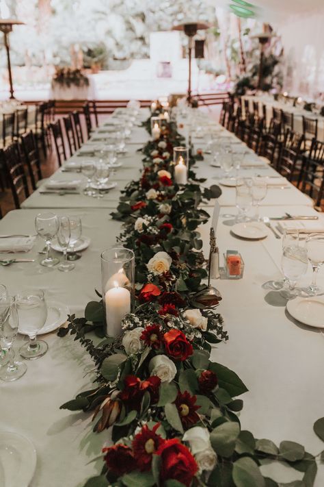 Winter Wedding With Red Accents, Hint Of Red Wedding, Winter Wedding Centerpieces Rectangle Table, Deep Red And White Wedding, Candle Decorations For Wedding, Black White Red Green Wedding, Red And Green Table Decor, Red White Green Floral Centerpieces, Winter Wedding Red And White