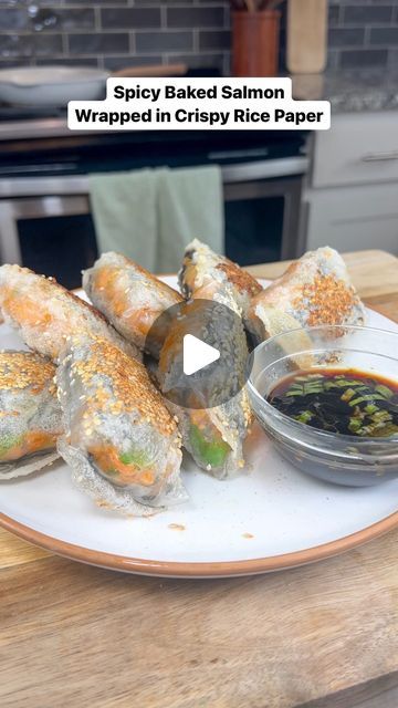 Taylor Jackzen on Instagram: "SPICY BAKED SALMON WRAPPED IN CRISPY RICE PAPER 🍣 putting my spin on the viral crispy rice paper hack and this is definitely one of my new favorite creations that I know y’all will love! Get the recipe below along with a few tips when working with rice paper. ⬇️  Rice paper tips: it only needs to be dipped into the water for about 15 seconds. It’ll still feel slightly stiff when you begin to fill it but will become more pliable by the time you wrap. I also find it helpful to work on top of a damp towel to prevent any sticking. Also, be sure to follow the double wrap method for this recipe so it doesn’t tear.  Ingredients:  For the Baked Salmon:  2 salmon filets Salt and pepper, to taste 2 tablespoons Kewpie mayonnaise 2 tablespoons Sriracha (adjust to taste) Salmon Rice Paper Dumplings, Salmon Rice Paper Rolls, Paper Dumpling, Rice Dumplings Recipe, Crispy Rice Paper, Salad Roll, Rice Wrappers, Rice Paper Recipes, Rice Paper Wraps