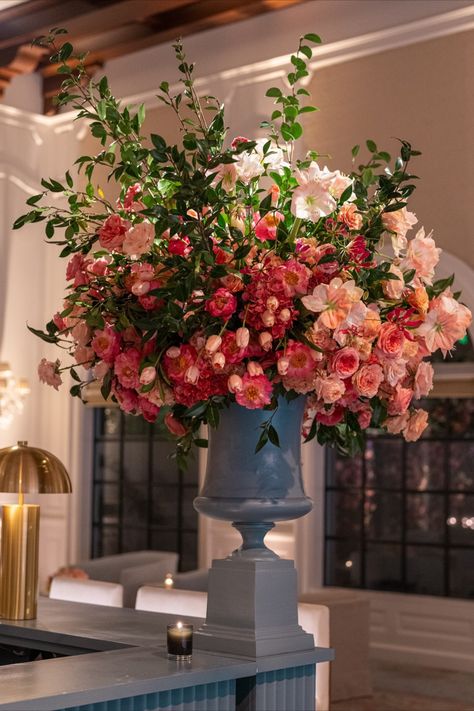 A grand floral arrangement featuring vibrant pink and peach blooms makes this bar an eye-catching focal point. Ideal for sophisticated events with a touch of luxury. Peach Floral Arrangements, Luxury Flower Arrangement, Hydrangea Centerpiece, Paper City, Wedding Inside, Coral Wedding, Floral Inspiration, Martha Stewart Weddings, Wedding Color Palette