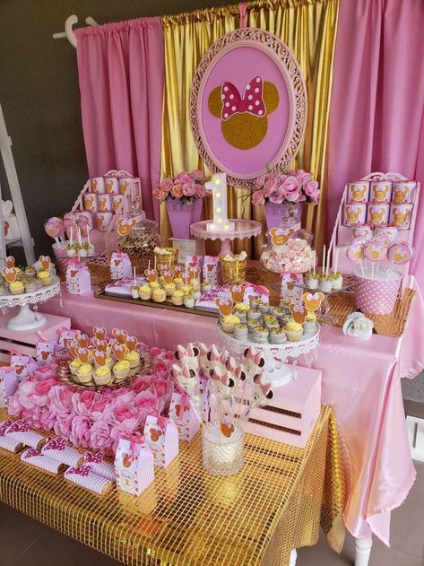 How pretty is this 1st Minnie Mouse birthday party? Love the dessert table!! See more party ideas and share yours at CatchMyParty.com   #catchmyparty #partyideas #minniemouseparty #girlbirthdayparty  #minniemouse1stbirthdayparty Minnie Mouse Desserts Table, Minnie Mouse Birthday Party Backdrop, Minnie Mouse Birthday Treat Table, Minnie Mouse Dessert Table Ideas, Minnie Mouse Treats Table, Minnie Mouse Candy Table, Minnie Mouse Dessert Table, Minnie Golden, Birthday Party Photos