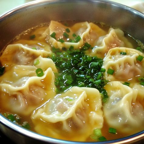 🥟🍲 Warm up with Mandu Guk—a comforting Korean dumpling soup that's perfect for any day! 🍜✨ #ManduGuk #DumplingSoup Mandu Guk (Dumpling Soup) Ingredients: Korean dumplings (8-10) Beef broth (4 cups) Garlic (3 cloves, minced) Green onions (2, chopped) Soy sauce (2 tbsp) Sesame oil (1 tbsp) Egg (1, beaten) Instructions: Heat sesame oil in a pot and sauté garlic until golden. Add beef broth and bring to a boil. Add dumplings and cook until tender. Stir in beaten egg and cook until set. Season... Korean Dumpling Soup, Mandu Guk, Korean Dumpling, Boiled Dumplings, Korean Dumplings, Dumpling Soup, Soup Ingredients, Instagram Recipes, Dumplings For Soup