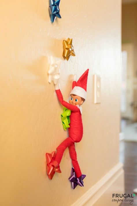 Easy Elf Idea - Bow Climbing Wall. 100s of Elf on the Shelf Ideas on Frugal Coupon Living plus Free Printables. #FrugalCouponLiving #ElfontheShelf #ElfontheShelfIdeas #ElfIdeas #funnyelfideas #funnyelfontheshelf #elfprintables #freeelfprintables #printables #freeprintables Elf Idea, Elf Printables, Kindness Elves, Easy Elf, Awesome Elf On The Shelf Ideas, Elf Activities, Elf Antics, Elf Fun, Santa Elf