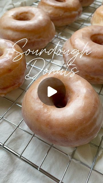 Emily🌾 on Instagram: "These sourdough donuts are heavenly! 

So light & fluffy perfect for a morning treat! Top them with glaze, sugar, powdered sugar or cinnamon sugar. You can’t go wrong! This recipe makes 12 donuts.

Recipe⬇️

Dough
100g sourdough starter
118g milk- preferably whole milk
50g melted butter- slightly cooled
1egg
5g vanilla
55g sugar
5g salt
300g bread flour 
•
Glaze
215g powered sugar
50g whole milk 

🌟INSTRUCTIONS ARE IN THE COMMENTS🌟

🌟Get 10% off @bakehouseessentials dough mat using COUPON CODE-emily10 - link in bio 

Follow @bakingtosurvive_ for more sourdough recipes & tips🥣
•
•
•
•
•
•
#sourdough#sourdoughdonuts#homemadedonuts#sourdoughbaking#sourdoughforbeginners#breadforbeginners#breadbasics#stretchandfold#bakingbasics#sourdoughrecipe#sourdoughfromscratch#hom Sourdough Donuts Recipe, Sourdough Donut Recipe, Sourdough Sweets, Sourdough Brioche, Donuts Recipe, Sourdough Recipes, Sweet Bread, Donut Recipes, Bread Flour