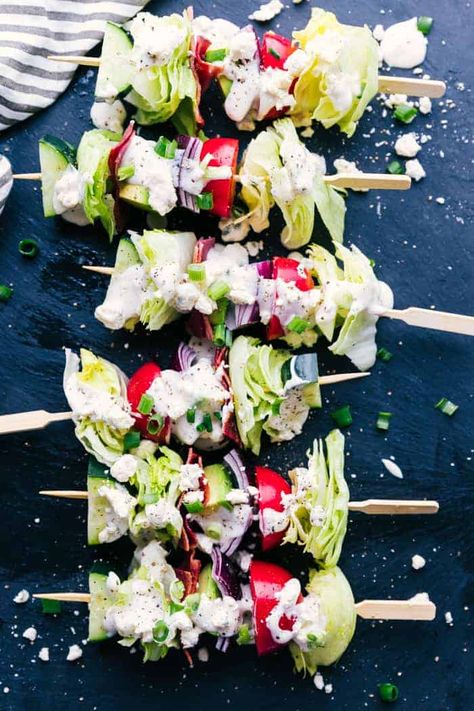 Wedge salad skewers on a black background Wedge Salad Skewers, Nye Appetizers, Bite Size Appetizers Easy, Wedge Salad Recipes, Salad Skewers, Skewer Appetizers, Wedge Salad, Elegant Appetizers, Fingerfood Party