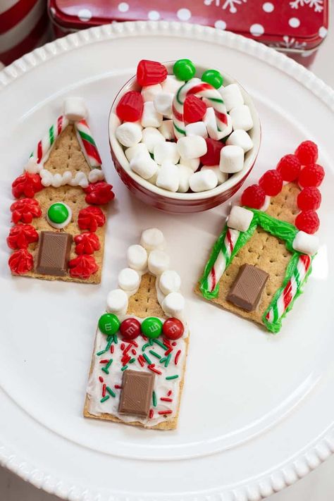 S'mores Gingerbread House (No Bake) | She's Not Cookin' Gingerbread House Easy Kids, Gram Cracker Gingerbread House Easy, Gingerbread Houses With Graham Crackers, Graham Cracker Gingerbread House Easy, Gingerbread House Graham Crackers, Gingerbread House Preschool, Gingerbread House With Graham Crackers, Gram Cracker Gingerbread House, Easy Gingerbread House Ideas