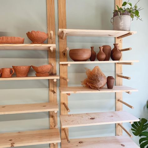 Pottery Studio Shelves, Pottery Studio Shelving, Dowel Shelves, Wooden Peg Board, Pottery Corner, Studio Pics, Tiny Pottery, Office Shelves, Garage Studio