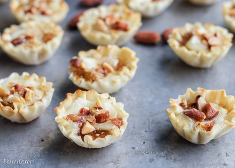 Easy Brie Bites • Bakerita Brie And Fig Jam, Brie Fig Jam, Appetizers Brie, Brie And Fig, Jam Bites, Phyllo Tart, Homemade Appetizers, Easiest Appetizers, Phyllo Shells