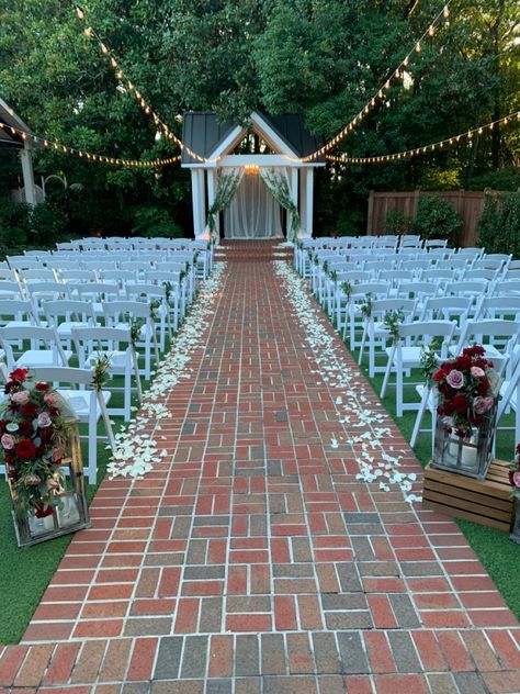 Wedding Aisle Block Off, Red Brick Wedding Venue Decor, Wedding Aisle Carpet Vintage Rugs, Roses Lining Aisle, Rose Petals Lining Aisle, Ceremony Decorations Outdoor, Wedding Isles, Hill Wedding, Brick Flooring