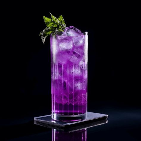 The Purple Passion is a sweet, fruity cocktail. It has a vibrant, tangy taste with a hint of citrus. The cocktail is light and refreshing, making it a great choice for a hot summer day. Purple Cocktails Recipe, Purple Passion Drink, Fish Bowl Recipe, How To Make Purple, Fruity Alcohol Drinks, Orange Liquor, Purple Drinks, Purple Cocktails, Soda Brands