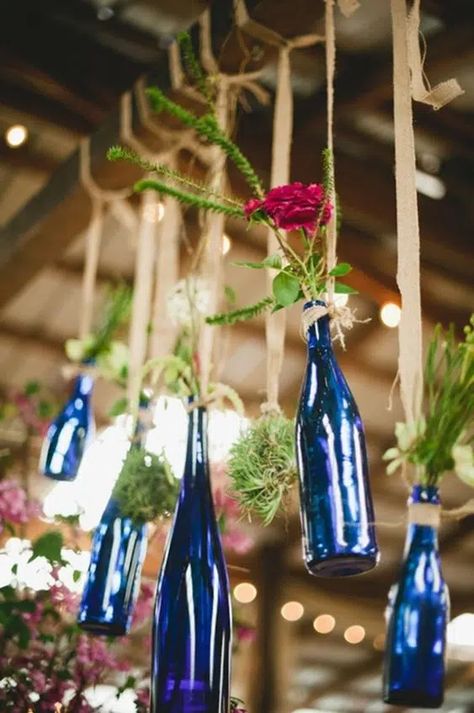 33 Best Mamma Mia Themed Party Ideas [2024] Cobalt Vases, Mamamia Party, Marquee Styling, Mamma Mia Wedding, Hanging Centerpiece, Wedding Ceiling, Bottle Trees, Wedding Wine Bottles, Bottle Tree