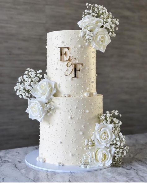 All White Cake Wedding, Ivory Cake Wedding, 2 Tier Elegant Wedding Cake, Black Gold And White Wedding Cake, 2 Tier Wedding Cake Flowers, Wedding Cakes Pearls And Flowers, Pearls On Wedding Cake, Couples Wedding Cake, Wedding Cake 100 Guests