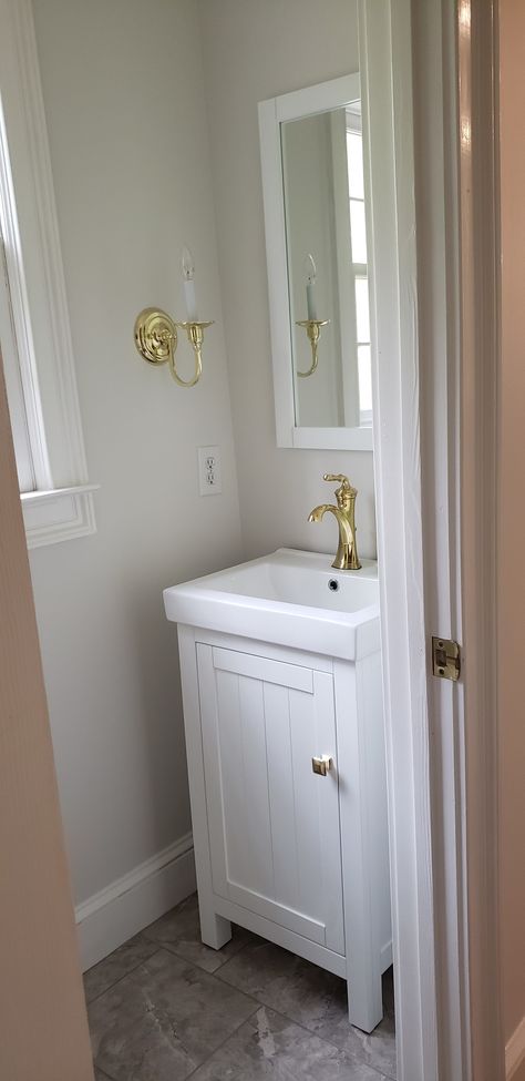 Benjamin Moore Lacey Pearl, Lacey Pearl Benjamin Moore Walls, Lacey Pearl Benjamin Moore, Tiny Half Bath, Beadboard Wall, Darryl Carter, Vanity And Mirror, Cream Walls, Grey Tiles