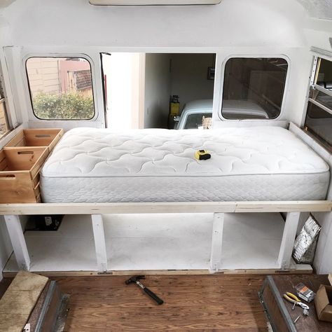 Bed frame with lots of storage space underneath. Camper Revamp, Mobile Art Studio, Skoolie Life, Caravan Hacks, Bus Journey, Layer Art, Interior Makeover, Converted School Bus, Camper Beds