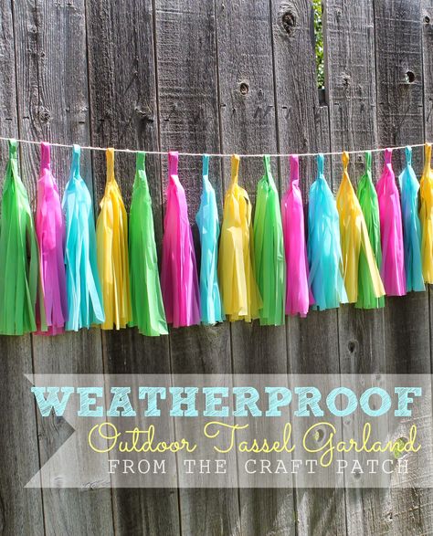 Have you seen the cute tissue paper tassel garlands popping up around blogland? I think they are adorable! I've got a very special birthd... Plastic Tablecloth Decorations, Backyard Party Decorations, Outdoor Garland, Diy Tassel Garland, Tissue Paper Tassel Garland, Tissue Paper Tassel, Table Cloth Decorations, How To Make Tassels, Pool Party Decorations