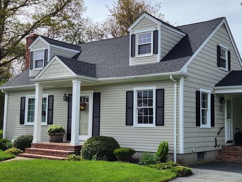 A GAF Timberline HDZ Roofing System in the color Charcoal in Acushnet, MA gives this home a whole new look!  Stylish, durable, and practically priced, a GAF roofing system is a smart investment for all homeowners. Choosing to install a GAF roof adds value and curb appeal to your home thanks to its multi-dimensional look as well as its reliability.  https://carefreehomescompany.com/gaf-roofing-on-cape-cod-style-home-acushnet-ma/  #gaf #roofing #contractor #familybusiness #awardwinning #roofingcontractor #freeroofquotes #acushnetma #southcoastma Curb Appeal Cape Cod House, Cape Cod Exterior Remodel, Mastic Vinyl Siding, Gaf Roofing, Cape Cod Renovation, Cape Cod Style Home, Cape Cod Exterior, Cape Cod House Exterior, Roofing Options