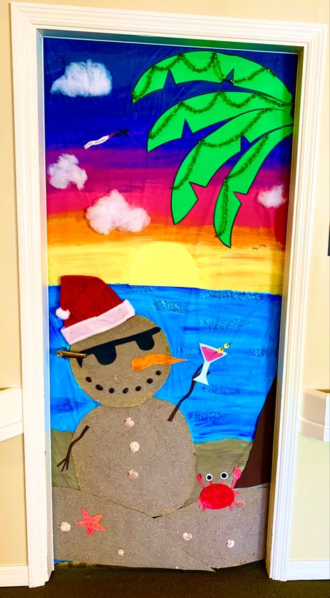 Actual beach sand, painted background,  paper cutouts of snowman’s glasses, crab, palm tree, sunset, martini glass, Mele Kalikimaka Door Decorations, Santa On Vacation, Christmas In July Classroom Ideas, Tropical Christmas Door Decorations, Beach Christmas Door Decorating Contest, Beach Door Decoration, Christmas Cruise Door Decorations, Christmas Hallway Decorations School, Florida Christmas Decorations