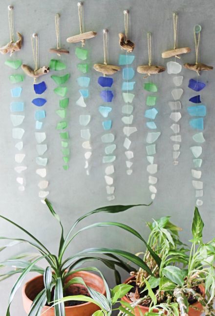 Sea Glass Chimes & Suncatchers that Bring an Oceanic Vibe to the Home. Lovely Hangings Made with Sea Glass. Featured on Completely Coastal. Sea Glass Hanging Decor, Sea Glass Wind Chimes Diy, Sea Glass Hanging Art, Seaglass Suncatcher Diy, Sea Glass Art Projects How To Make, Seaglass Windchime Diy, Sea Glass Decor Diy, Sea Glass Sun Catcher Diy, Beach Glass Wind Chimes