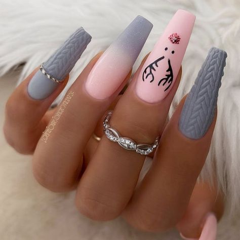 This winter-themed nail art features a cozy knitted effect on grey nails, paired with a soft pink ombre that fades into white. The middle nails are adorned with a stylish reindeer silhouette and a touch of rhinestones, adding a festive yet classy touch. Gray Ombre Nails, Middle Nails, Grey Nails, Reindeer Silhouette, Gray Ombre, Pink Ombre Nails, Winter Nails Acrylic, Gray Nails, Grey Ombre