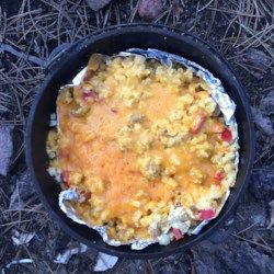 Dutch Oven Mountain Man Breakfast - Allrecipes.com Mountain Man Breakfast, Dutch Oven Breakfast, Man Breakfast, Oven Breakfast, Campfire Meals, Dutch Oven Camping Recipes, Healthy Camping Food, Camping Hacks Food, Dutch Oven Camping