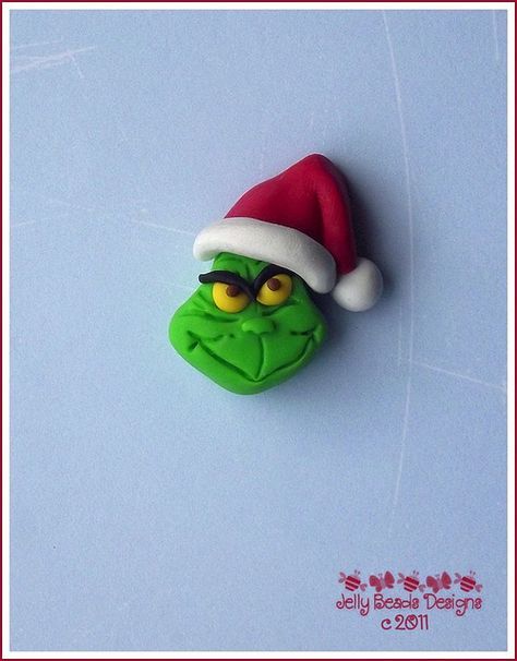 *SORRY, no information given as to product used ~ grinch face, via Flickr. Grinch Clay Earrings, Polymer Clay Christmas Ornaments, Grinch Ornament, Clay Christmas Decorations, Grinch Face, Clay Magnets, Diy Earrings Polymer Clay, Clay Christmas, Polymer Clay Ornaments