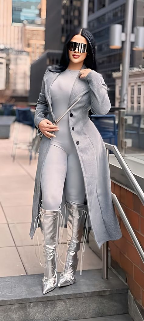 Light Grey Long Coat Outfit, Cold Rainy Night Out Outfit, White And Silver Outfit Black Women, One Piece Body Suit Outfit Winter, Silver Jumpsuit Outfit, Silver Knee High Boots Outfit, Gray And White Outfits, Silver Boots Outfit Black Women, Trench Coat Outfit Black Women