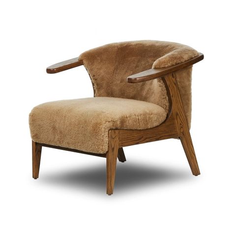 Dimensions: 30.75"w x 33.00"d x 28.25"h Arm height: 28 in Seat height: 17.3 in Seat depth: 23 in Seat width: 22 in Materials: 100% Sheared Sheepskin, Solid Ash Color: Desert Shearling, Amber Ash Wood Weight: 39 lbs Subtle paddle arms and a wrap frame of amber-finished ash embrace soft brown shearling, while S-spring construction ensures exceptional comfort. Candle Table Decorations, Bedroom Sideboard, Study Furniture, Dude Ranch, Dining Room Bench, Kitchen Mirror, San Clemente, Living Room Furniture Sofas, Four Hands