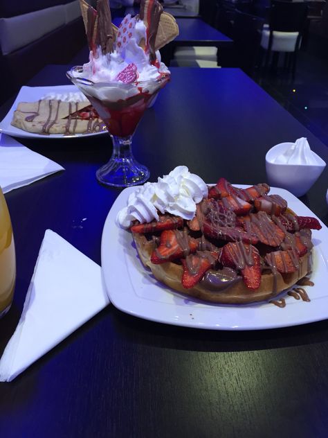 Nutella waffle and pancake with strawberry  sundae. Perfect for a date night with your other half. Served in all deserts lounge. #Coffee'n'Creamz London, Kingsbury Desert Date Night, Nutella Waffle, Nutella Waffles, Strawberry Sundae, Food Smoothies, Other Half, Smoothie Recipes, Nutella, Diner