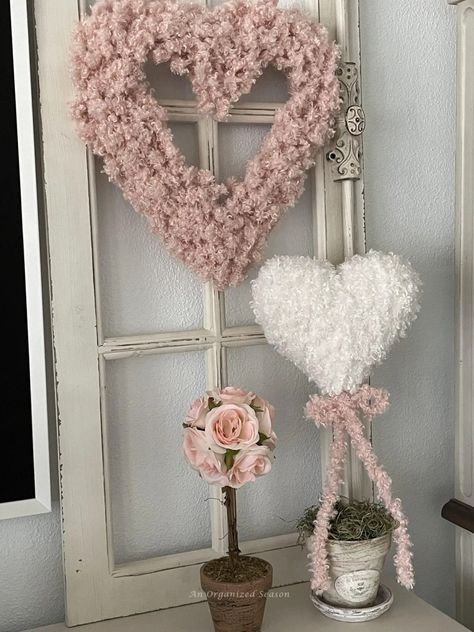 Do you love topiaries? I'm going to show you how to take a Dollar Tree styrofoam heart and turn it into a beautiful DIY topiary to decorate for Valentine's Day! Learn how to make a topiary using Teddy Bear yarn and a styrofoam heart. This is a simple DIY project so grab your glue gun and let's get started! Please pin this and follow us for more DIY and seasonal decor inspiration! Neutral Valentines Decor, Diy Topiary, Diy Headboard Ideas, Flower Oasis, Topiary Diy, Valentine Wreath Diy, Tree Heart, Valentines Inspiration, Headboard Ideas