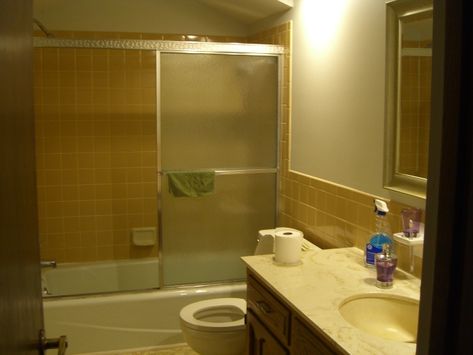 Bathroom Makeover; Yellow & Gray Color Scheme Yellow Tile Bathroom Ideas, Yellow Tile Bathroom, Yellow Bathroom Tiles, Tile Makeover, Yellow Bathroom Walls, Yellow Grey Bathroom, Yellow Bathroom Decor, Gray Bathroom Accessories, Bath Makeover