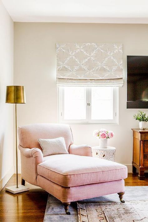 Master bedroom features reading corner filled with a pink linen roll arm chaise lounge next to a white cloud stool illuminated by brass and marble floor lamp placed under window. Casa Vintage, Pink Chair, Chaise Lounges, Decoration Inspiration, Parisian Chic, A Living Room, 인테리어 디자인, Home Deco, Room Inspiration