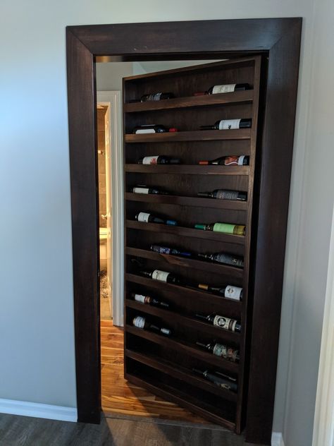 Wine rack when closed, completely hidden doorway Hidden Door Wine Rack, Hidden Shelf Door, Gömda Rum, Secret Door Ideas, Hidden Doorway, Hidden Door Ideas, Entry Organizer, Hidden Closet, Secret Doors