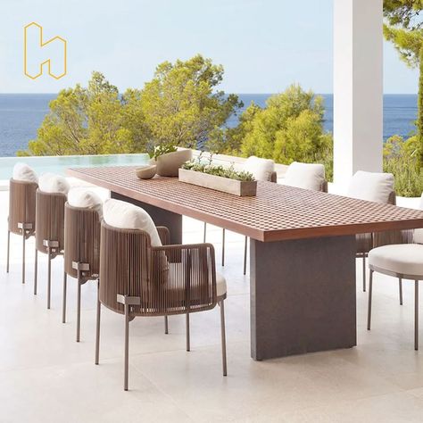 Bring an ideal addition to your outdoor space with this dining set. Featuring a natural and elegant style, this set can easily bring a touch of glamour to outdoor places such as patio, garden, terrace, etc. Crafted from weather-resistant rope and teak wood, it is able to withstand numerous unexpected situations and remain durable. And the high-density foam definitely brings you optimal comfort. Luxury Garden Furniture, Rattan Lounge Chair, Outdoor Tables And Chairs, Rattan Garden Furniture, Teak Dining Table, Patio Dining Table, Stylish Chairs, Patio Dining Chairs, Table And Chair